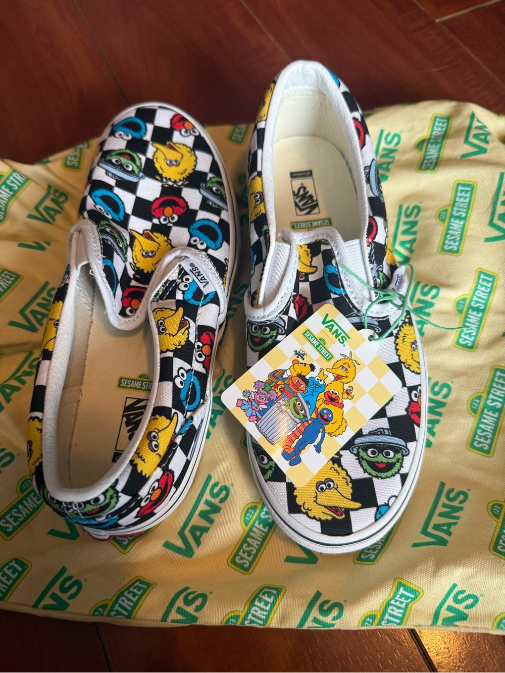 Vans Kids Slip-On Sneakers in Black, White & Multicolor Sesame Street Print